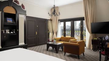 Suite Junior, 1 trÚs grand lit | Coin séjour | Télévision LED de 50 pouces avec chaßnes par satellite