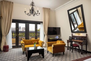 Suite Junior, 1 très grand lit | Coin séjour