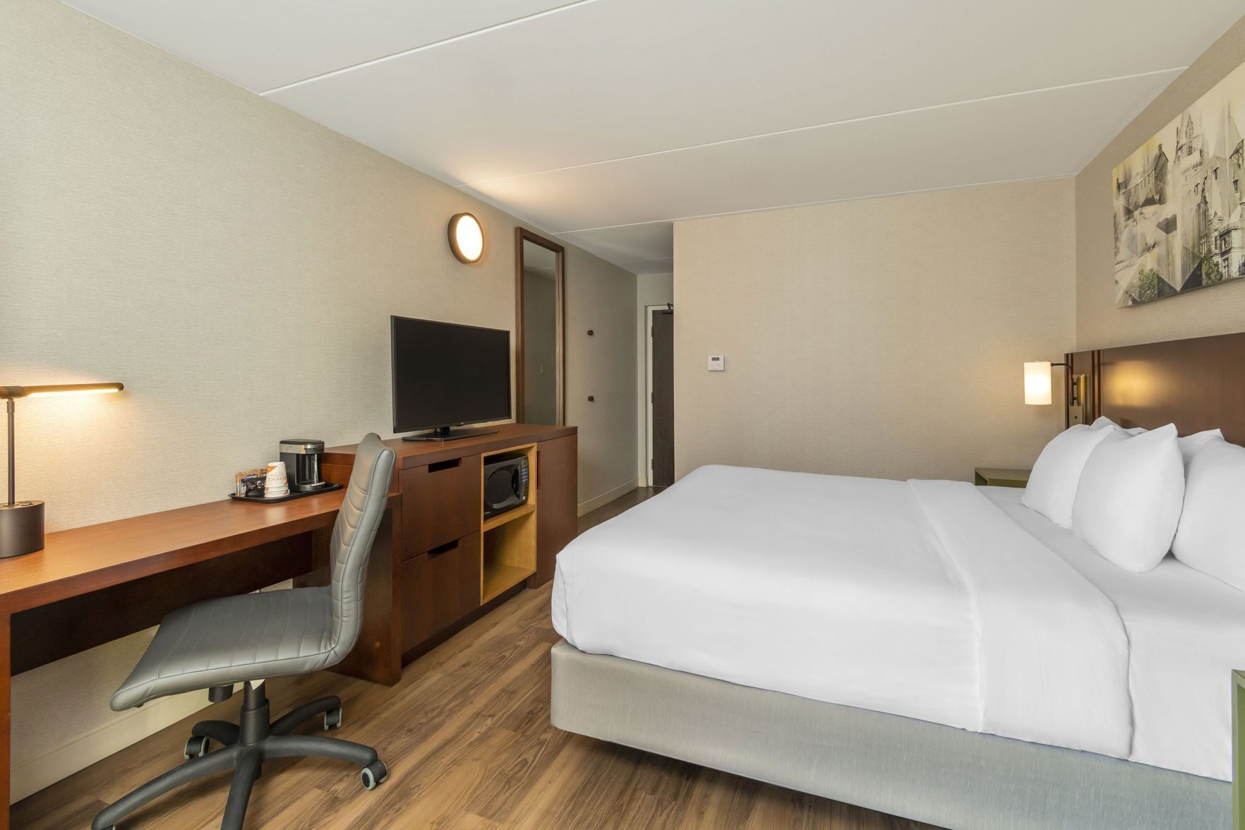 Premium bedding, Select Comfort beds, desk, blackout drapes