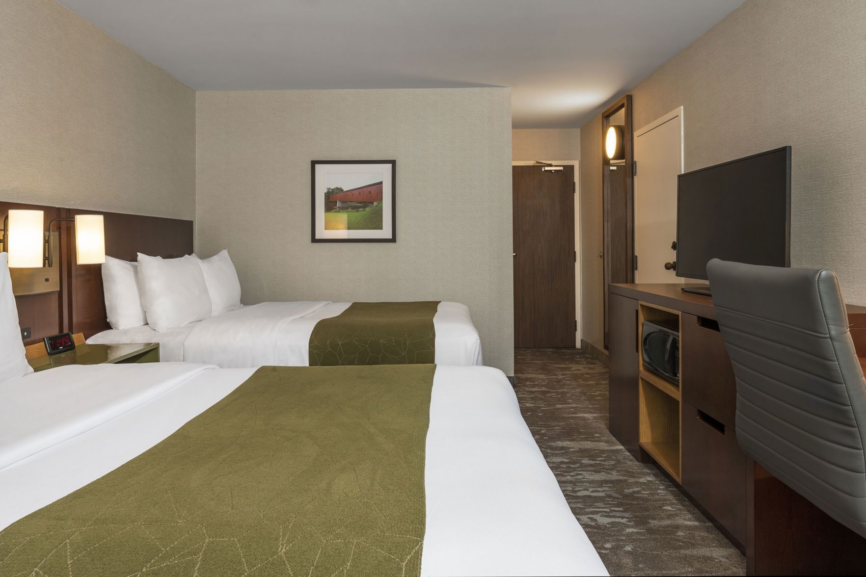Premium bedding, Select Comfort beds, desk, blackout drapes