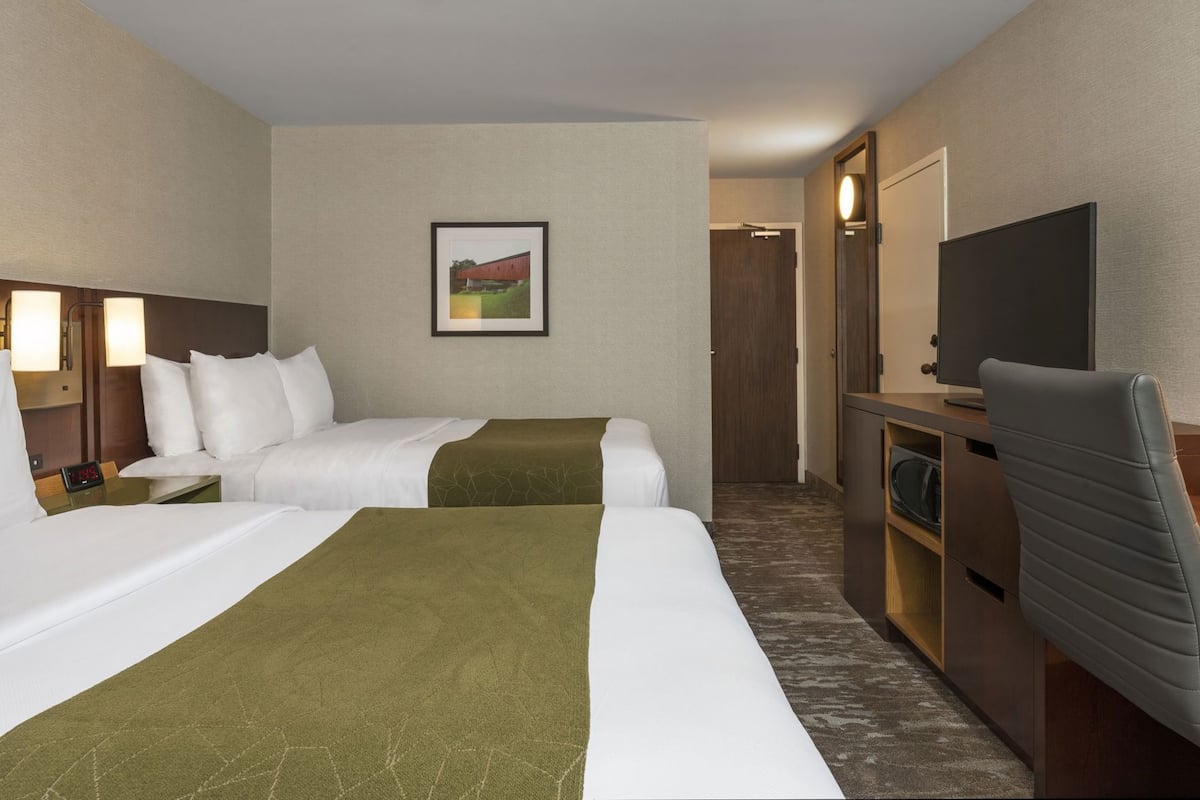 Premium bedding, Select Comfort beds, desk, blackout drapes