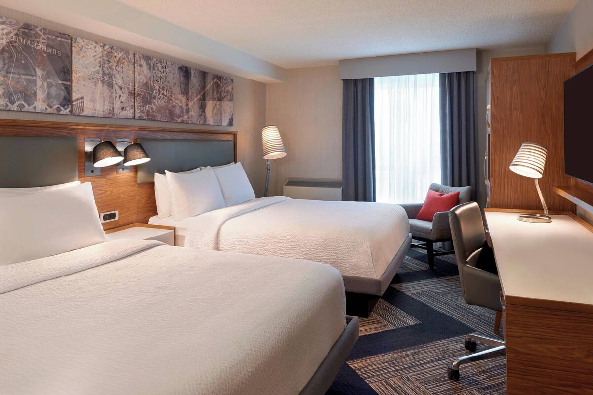 Room, 2 Queen Beds | In-room safe, iron/ironing board, free cots/infant beds, free WiFi