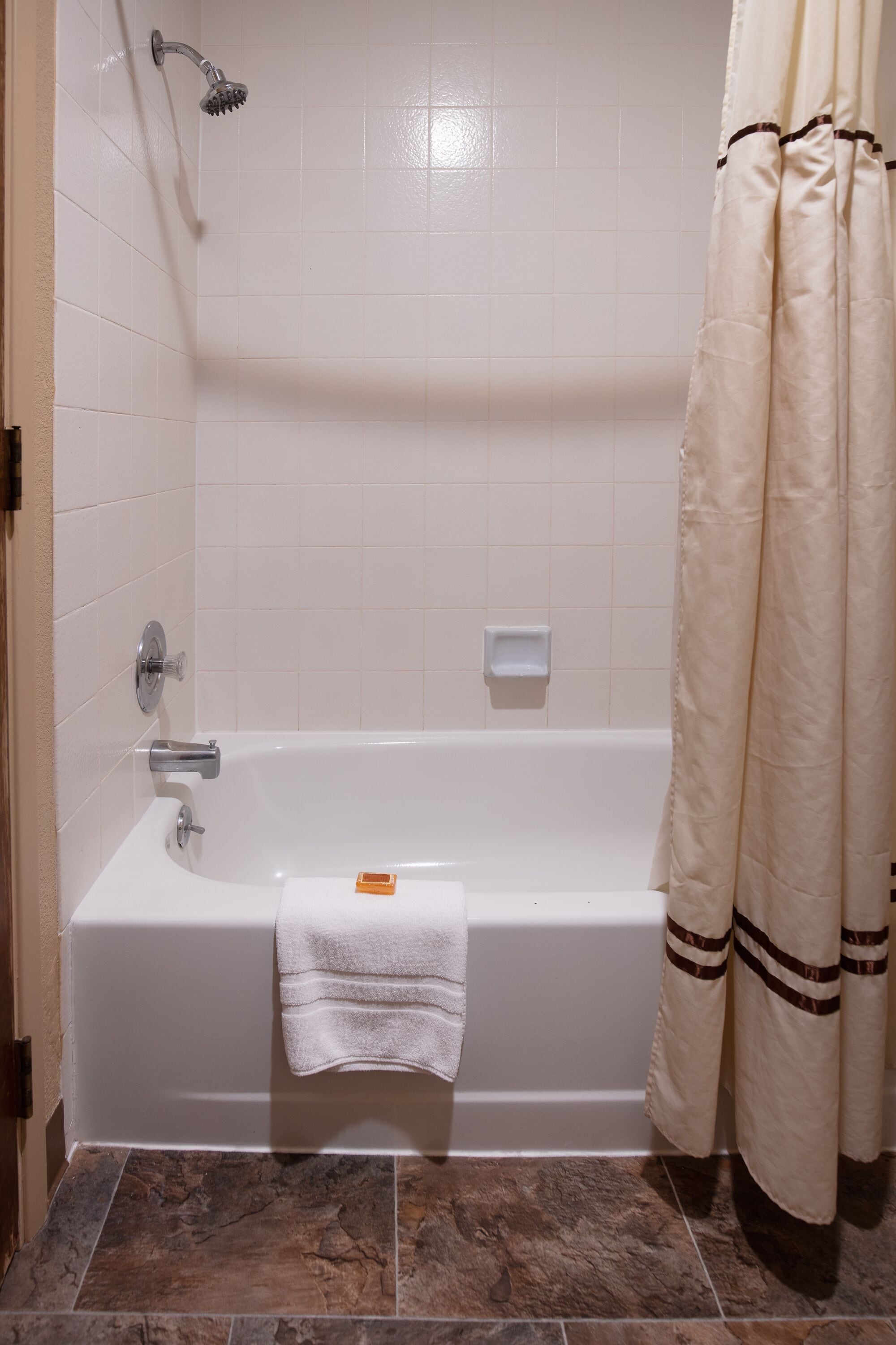 combined shower/bathtub, free toiletries, hair dryer, towels