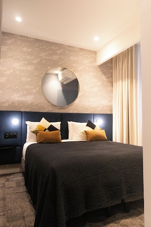 Ropa de cama de alta calidad y minibar