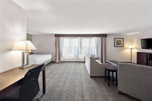 Suite, 1 King Bed, Non Smoking, Jetted Tub (Larger Room;with Sofabed) | 1 bedroom, in-room safe, desk, laptop workspace