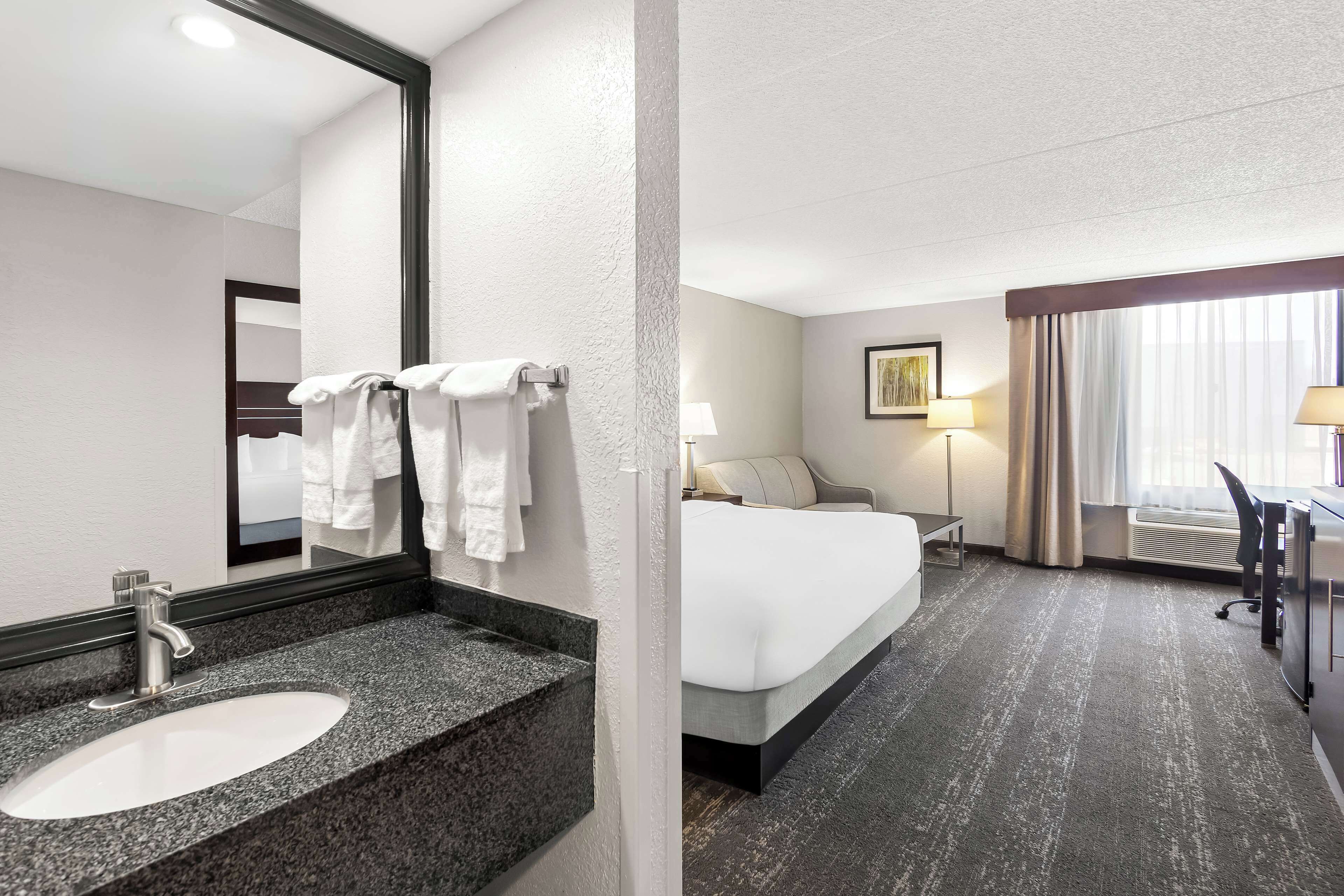 standard room, 1 king bed, non smoking, refrigerator & microwave (with sofabed) | in-room safe, desk, laptop workspace, iron/ironing board