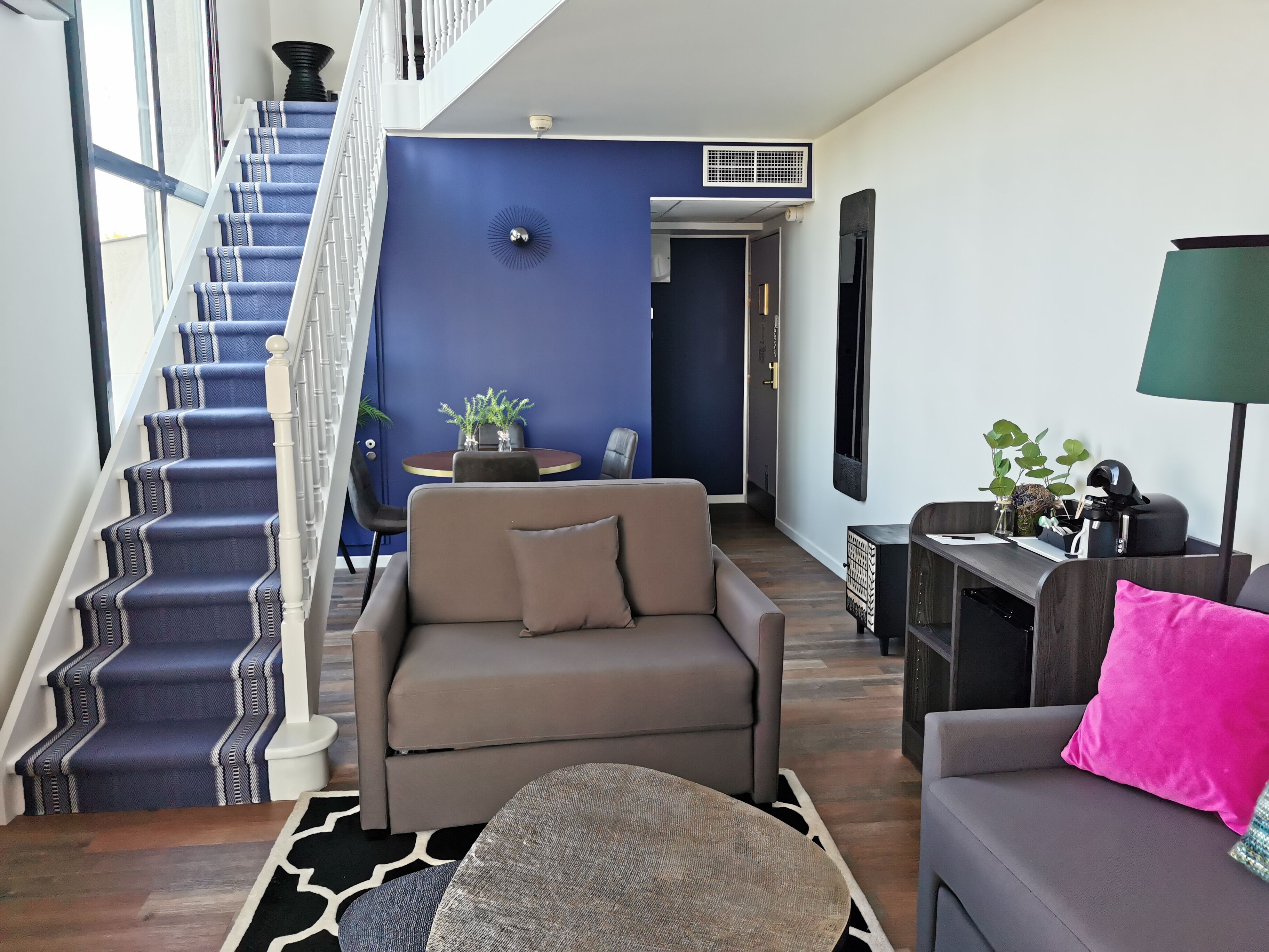 suite, 1 king bed with sofa bed, terrace (duplex) | living area | 32-inch flat-screen tv with satellite channels, tv