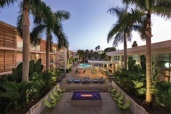 Outdoor pool, open 9:00 AM to 10:00 PM, free pool cabanas, pool loungers