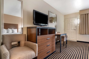 Premium bedding, desk, laptop workspace, iron/ironing board