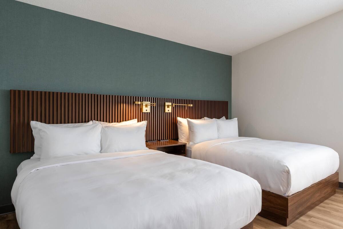 Standard Room, 2 Queen Beds, Non Smoking | Desk, blackout drapes, iron/ironing board, cribs (free)