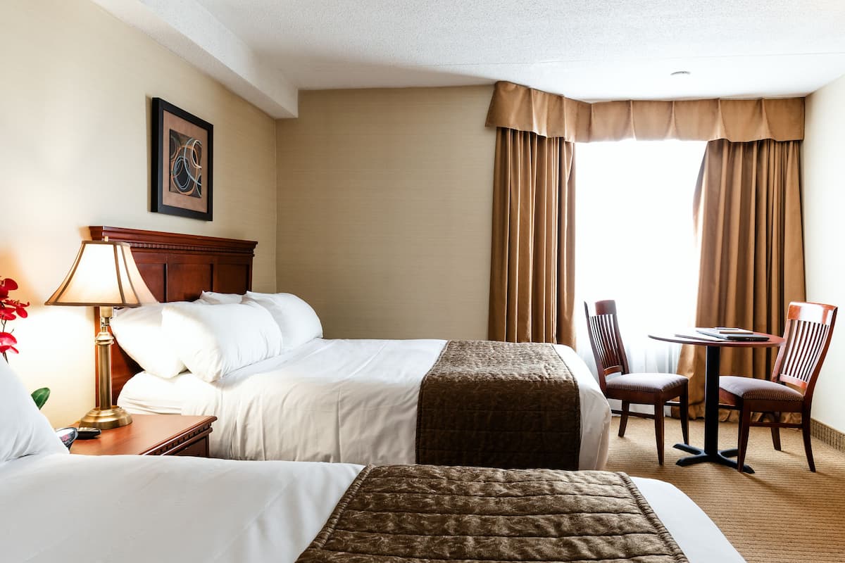 Traditional Room, 2 Double Beds | Pillowtop beds, in-room safe, individually furnished, laptop workspace
