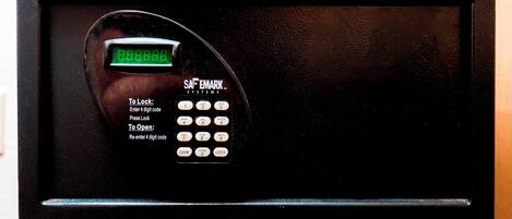 A digital lock system with a keypad and a display.
