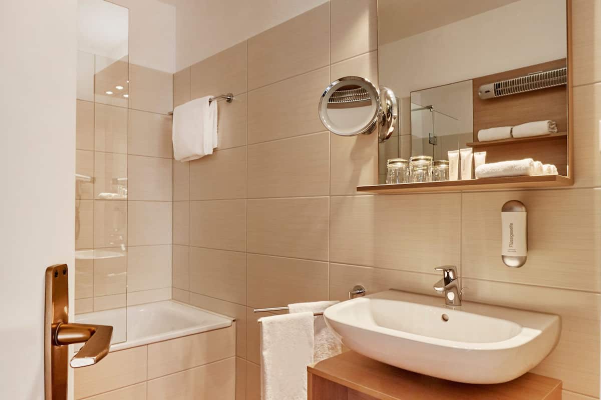 hair dryer, bathrobes, towels