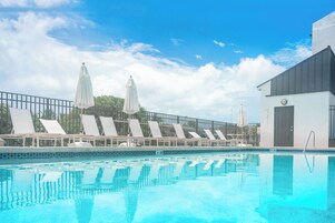 Outdoor pool, pool umbrellas, sun loungers