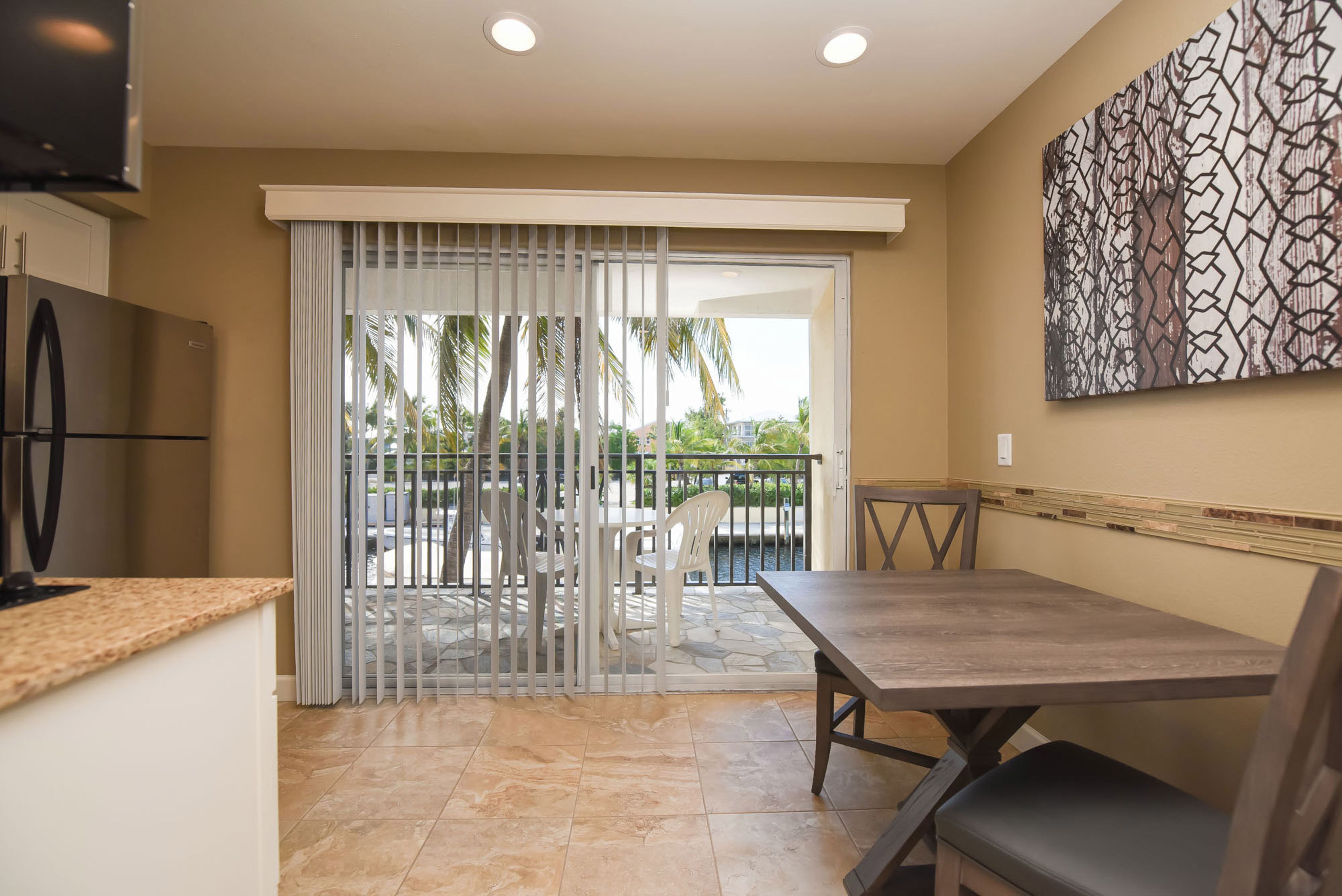 full-sized fridge, microwave, stovetop, dishwasher