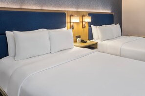 Premium bedding, pillow-top beds, desk, blackout curtains