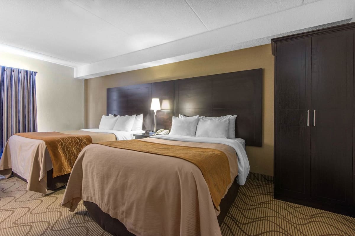 Premium bedding, pillow-top beds, desk, blackout curtains