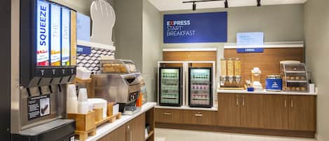 A modern breakfast area with a touchless beverage dispenser, refrigerated display cases, and a sign for Express Start Breakfast.