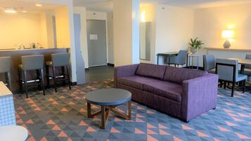 Hypo-allergenic bedding, desk, laptop workspace, blackout curtains