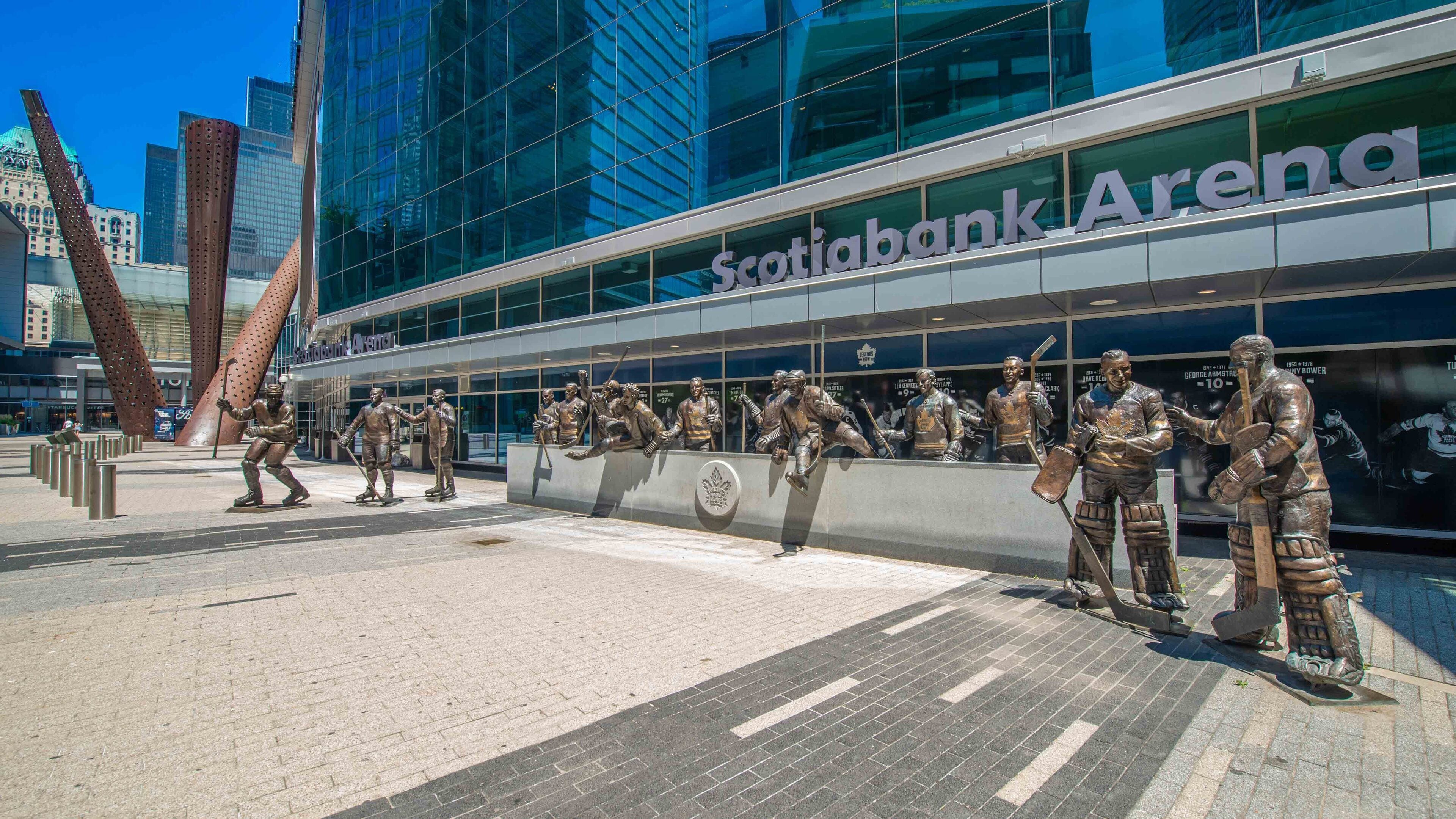A modern building with a glass facade and the name "Scotiabank Arena" on the side.