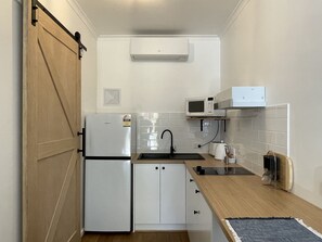 Estúdio | Cozinha privada | Frigobar, micro-ondas, chaleira elétrica, torradeira