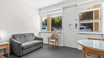 Studio | Living area | 32-inch flat-screen TV with digital channels, TV