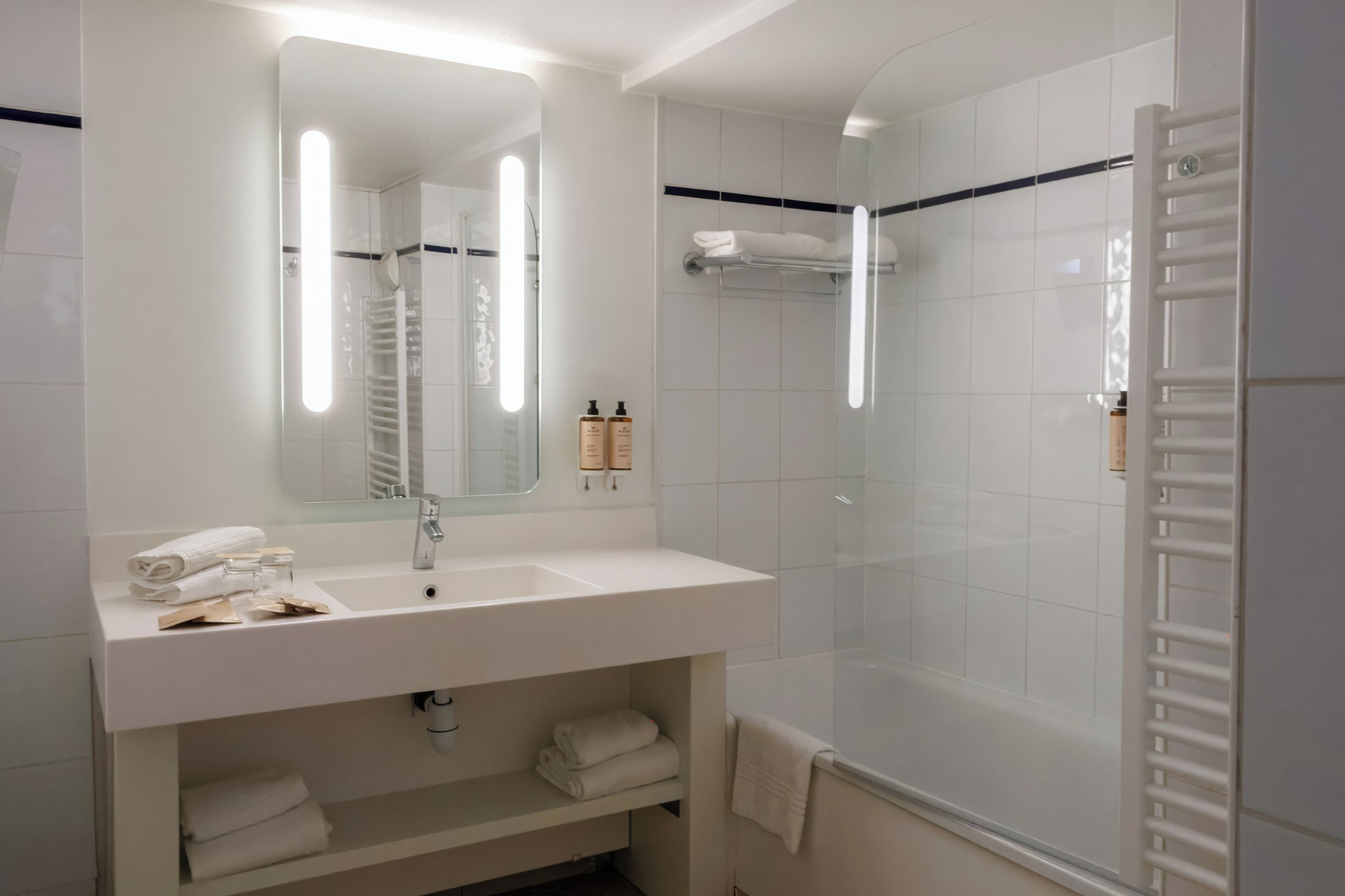 eco-friendly toiletries, hair dryer, towels