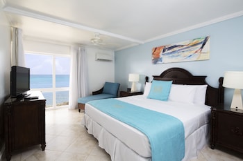 Premium bedding, in-room safe, desk, iron/ironing board at The Club, Barbados Resort & Spa Adults Only - All Inclusive