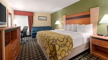 Relax in a stylish room with a large bed, desk, and flat-screen TV.