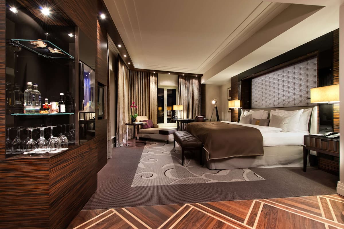 junior double room | 1 bedroom, premium bedding, minibar, in-room safe