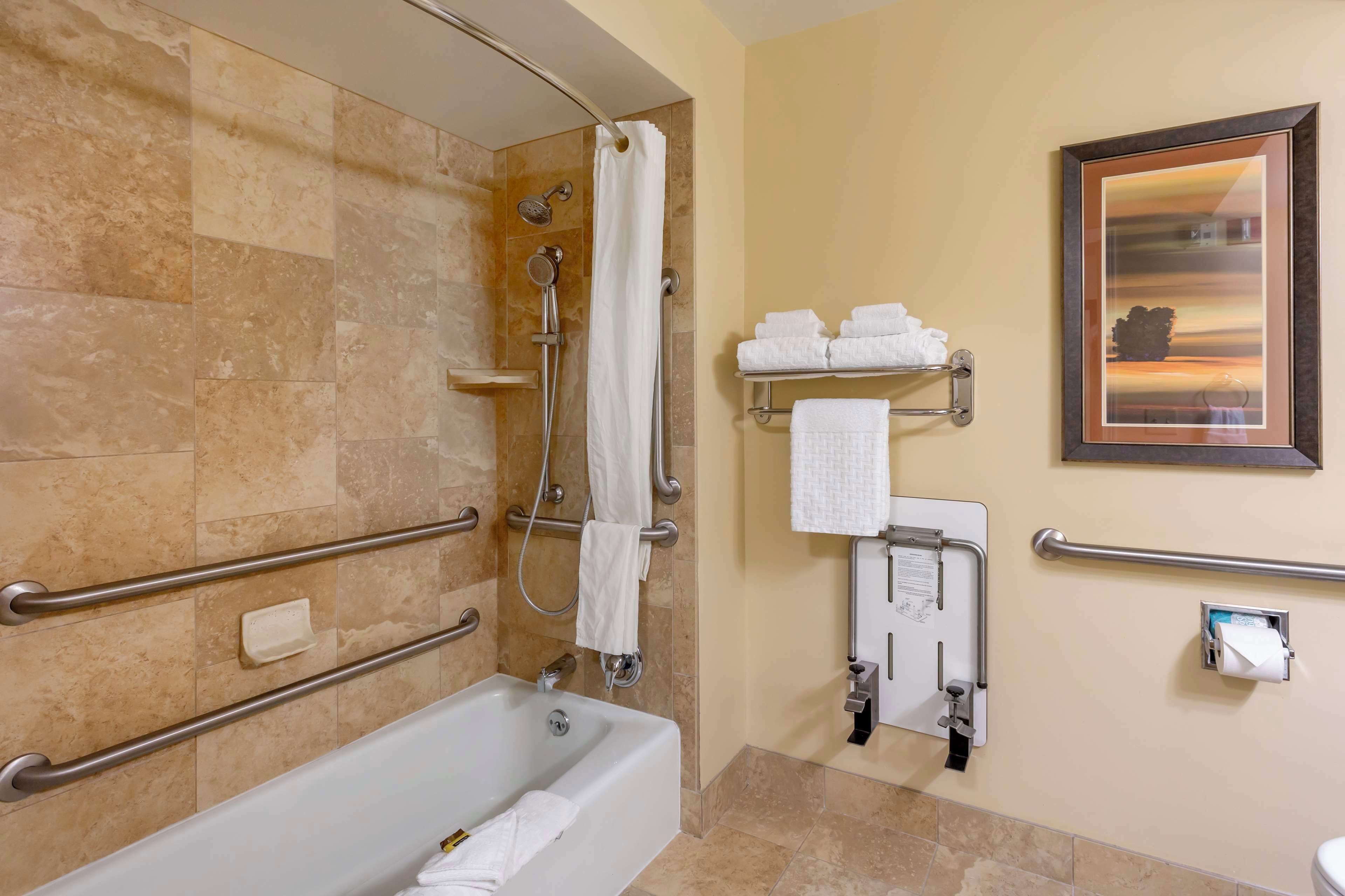 suite, 2 queen beds, non smoking, refrigerator & microwave (with sofabed) | bathroom | combined shower/bathtub, free toiletries, hair dryer, towels