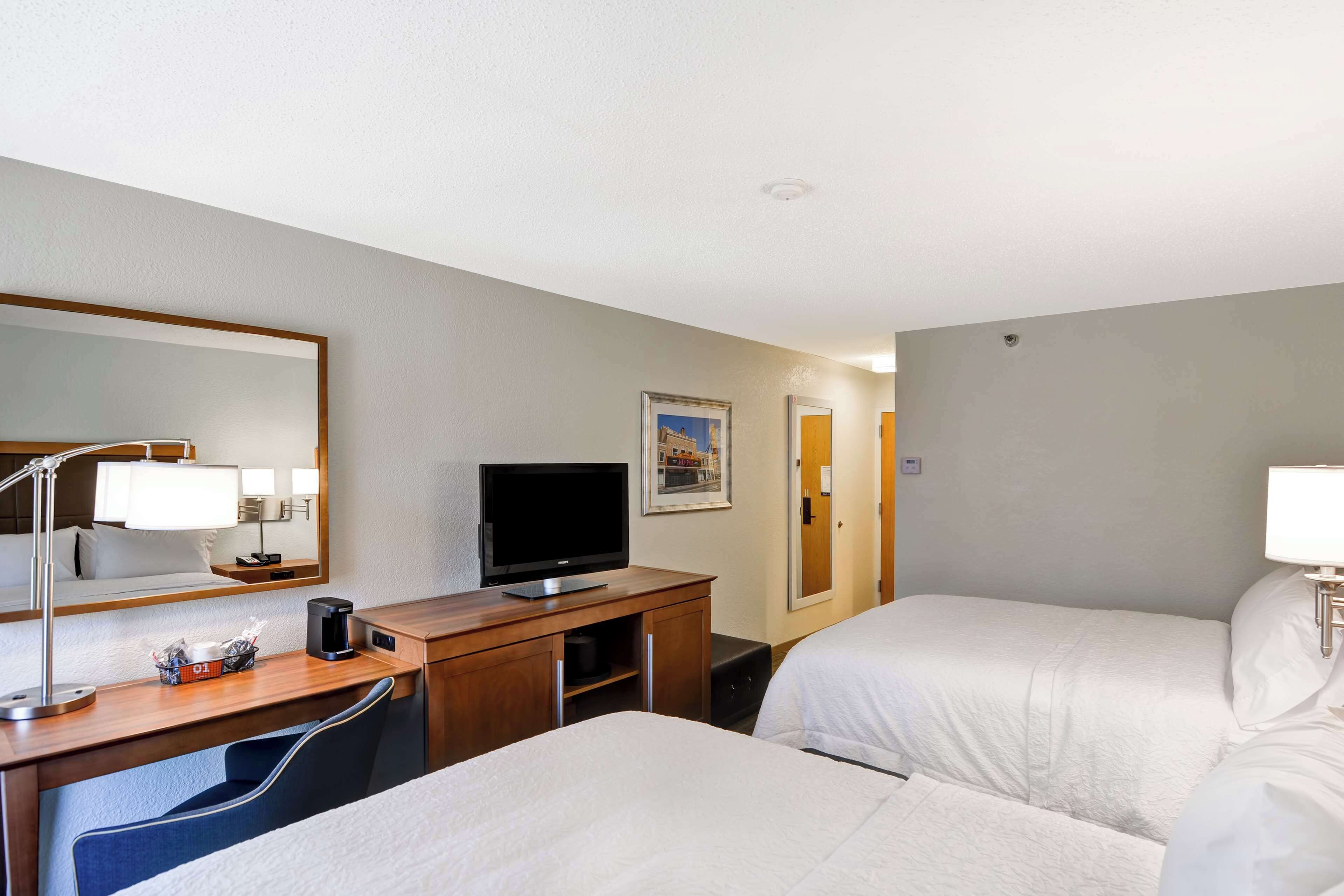 room, 2 queen beds, non smoking | in-room safe, desk, iron/ironing board, free cots/infant beds