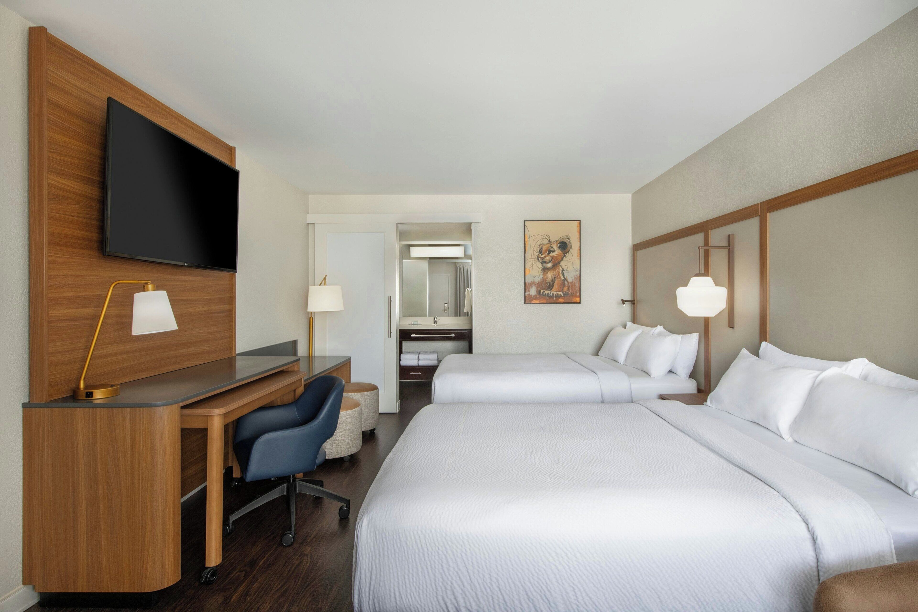 Deluxe Room, 2 Queen Beds | Hypo-allergenic bedding, in-room safe, desk, blackout drapes