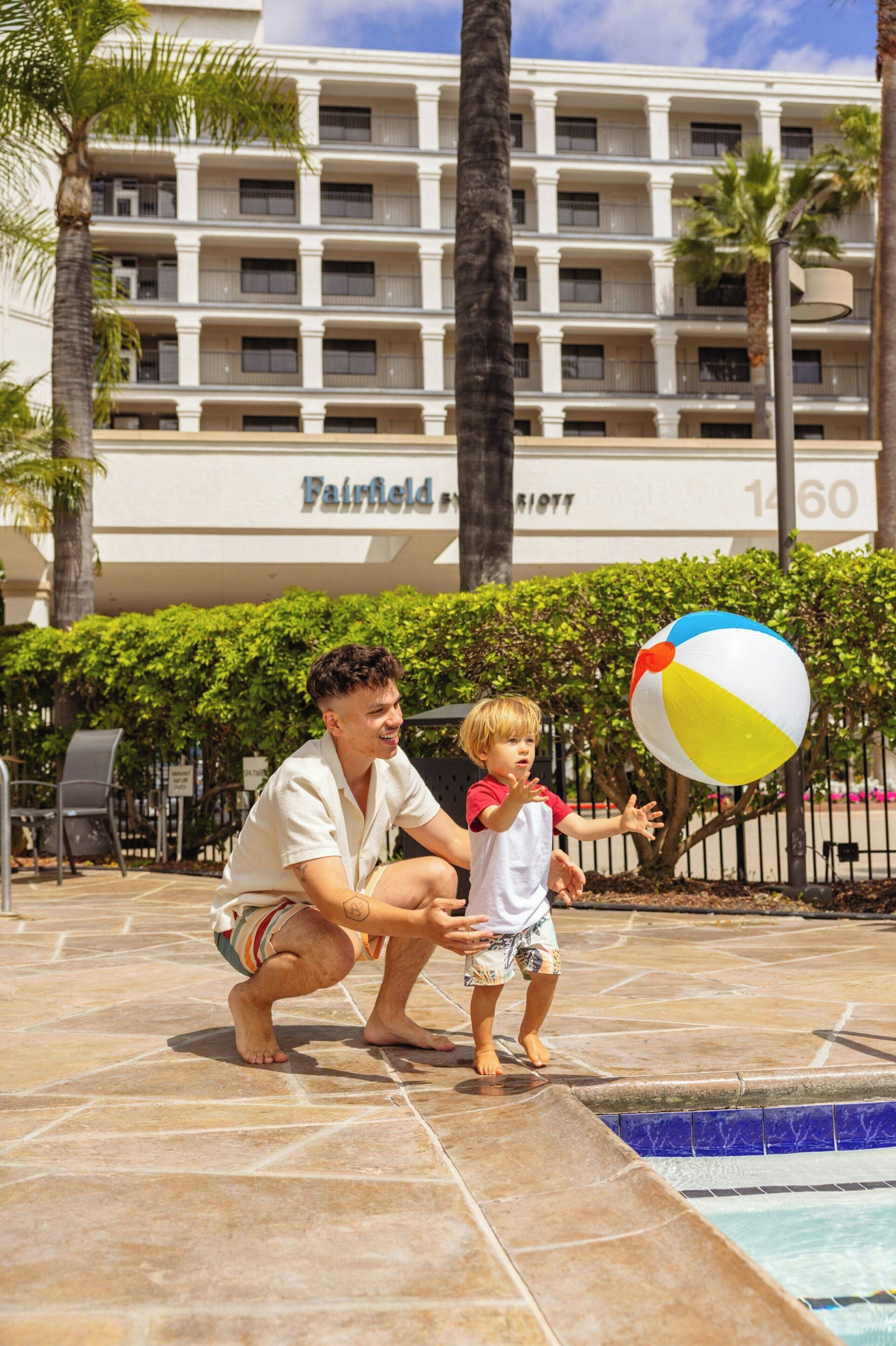 outdoor pool, open 8:00 am to 10:00 pm, pool umbrellas, pool loungers