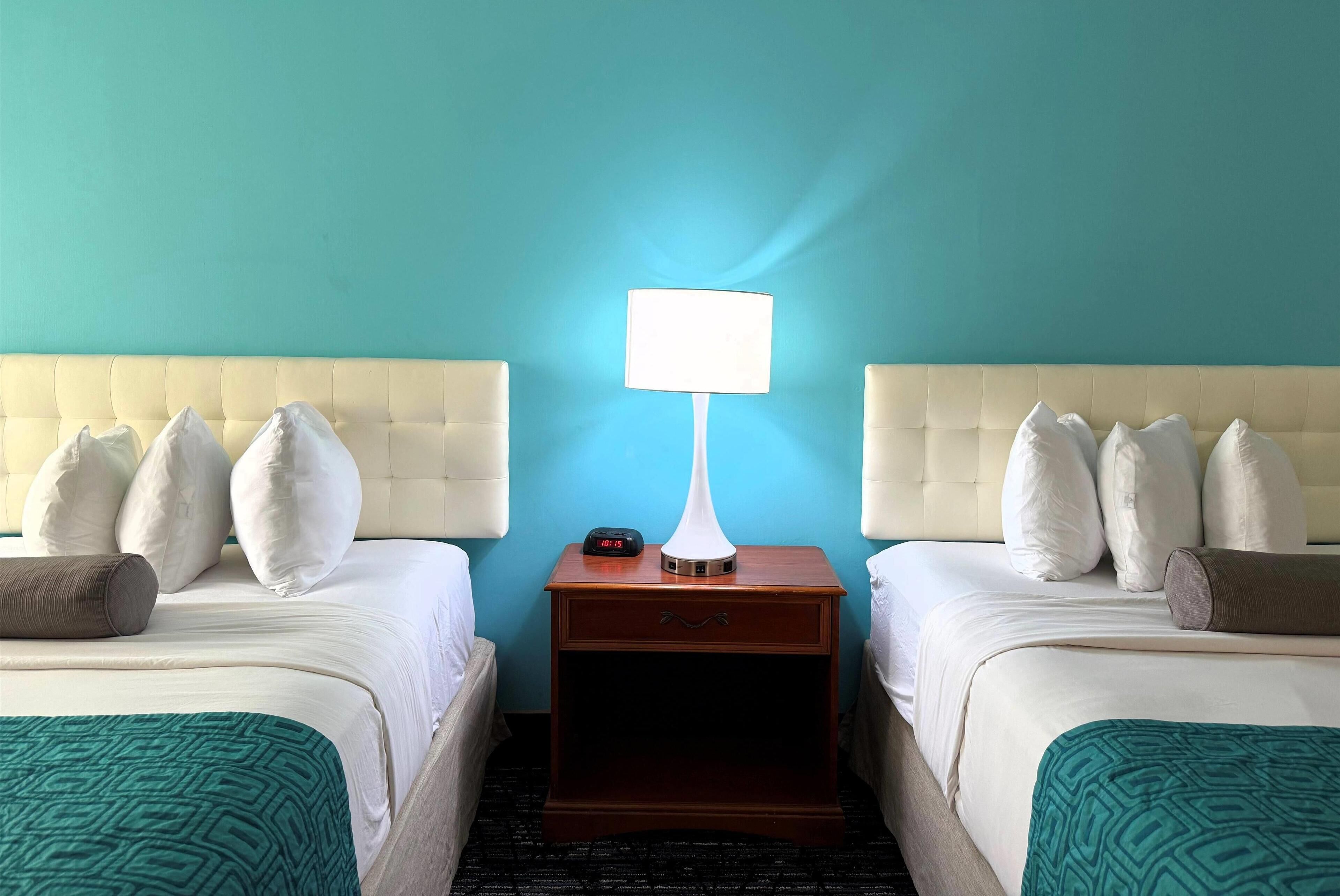 standard room, 2 queen beds, non smoking | desk, iron/ironing board, rollaway beds, free wifi