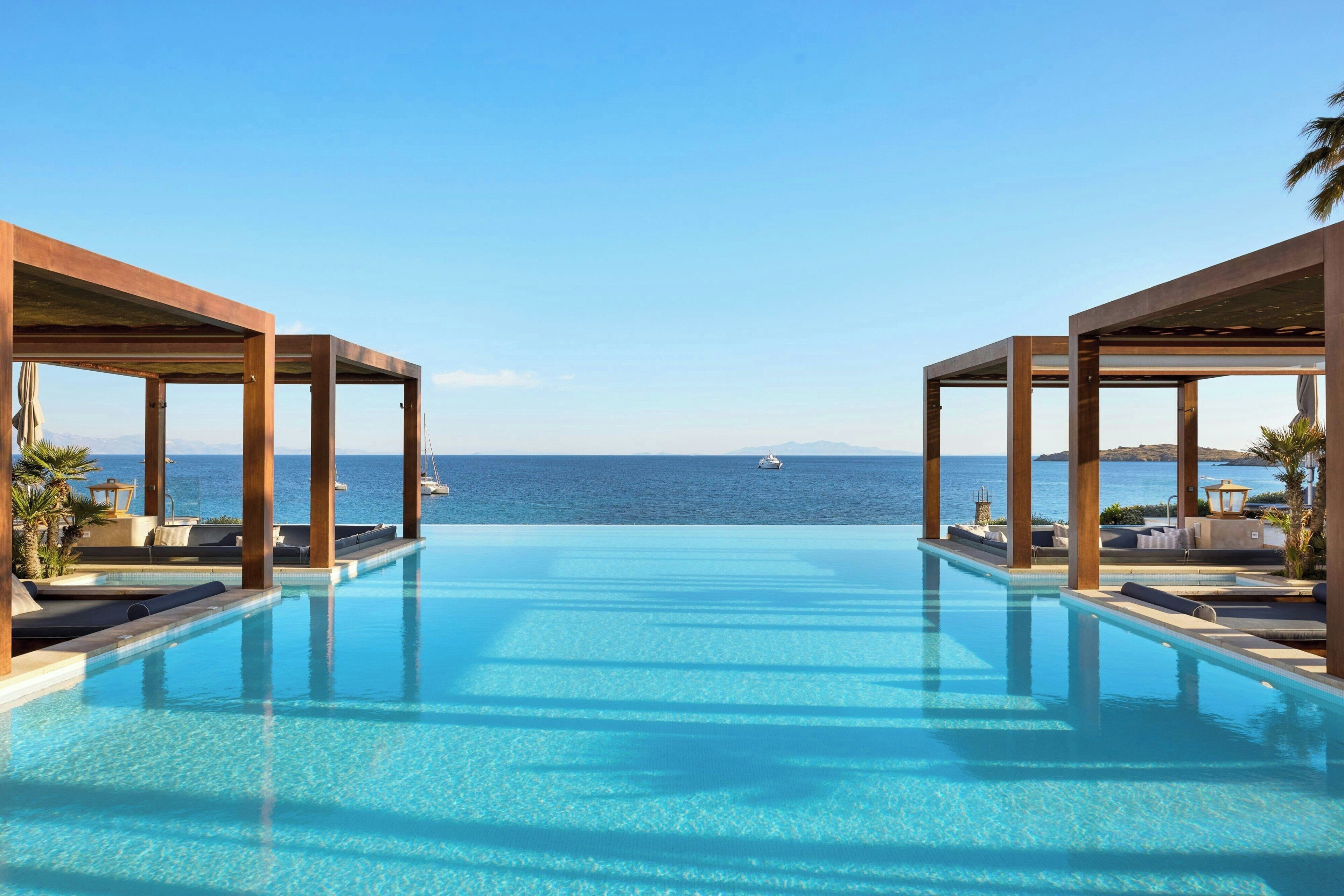 2 outdoor pools, pool umbrellas, pool loungers