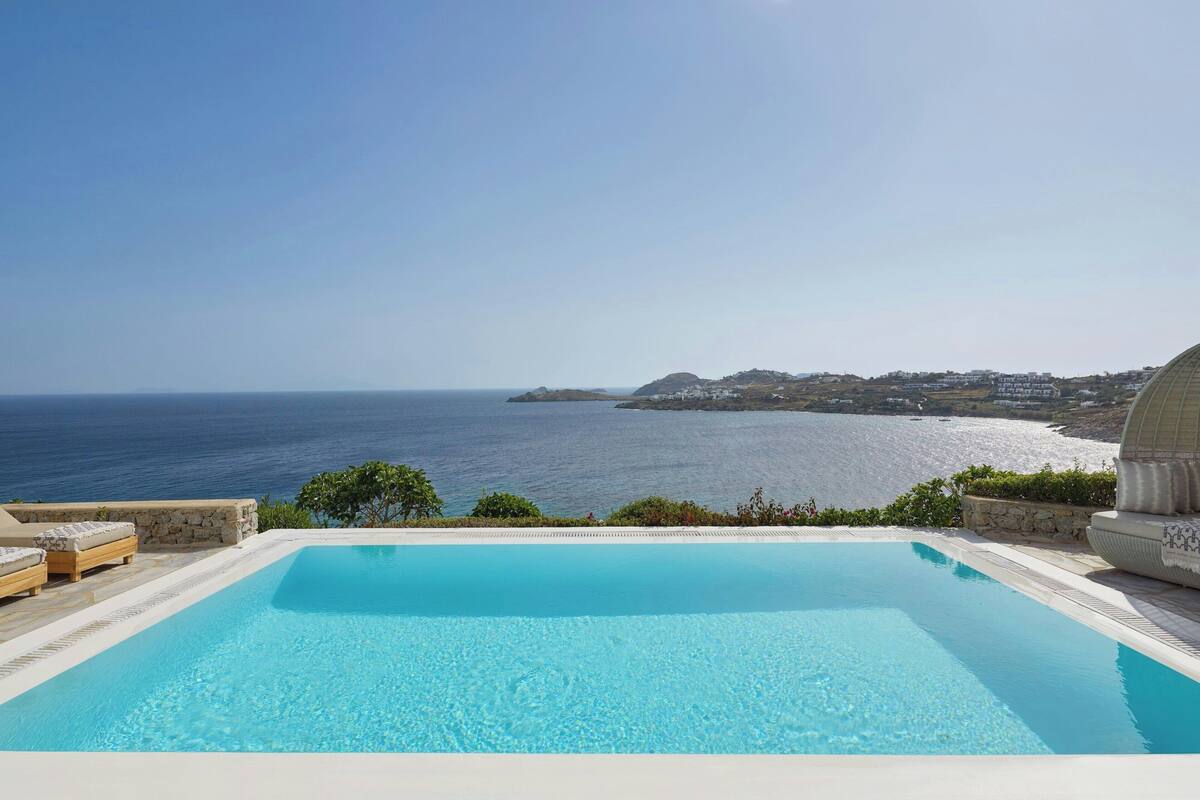 Villa, 4 Bedrooms, Sea View (Balcony) | Pool | 2 outdoor pools, pool umbrellas, sun loungers