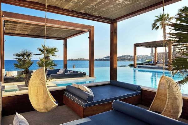 2 outdoor pools, pool umbrellas, sun loungers