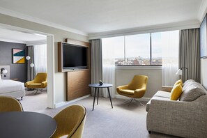 Executive Suite, 1 Bedroom, Non Smoking | Living area | 49-inch flat-screen TV with satellite channels, TV