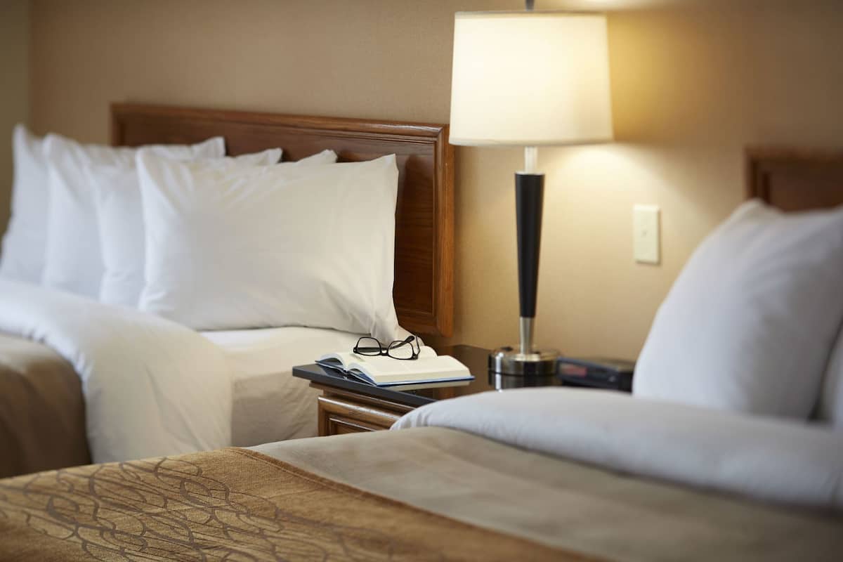 Premium bedding, pillowtop beds, desk, blackout drapes