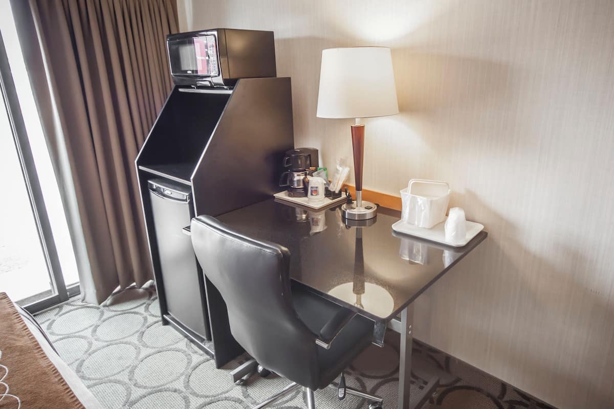 premium bedding, pillow-top beds, desk, blackout curtains