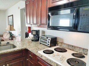 Deluxe Condo, 2 Bedrooms, Non Smoking | Private kitchen | Fridge, microwave, stovetop, dishwasher