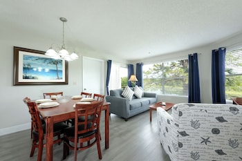 Premium Suite, 2 Bedrooms | Living area | 32-inch flat-screen TV with cable channels, TV at Parc Corniche Condominium Suite Hotel