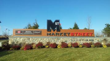 A sign for Market Street with logos of BSC, Sheraton, and Arborpoint.