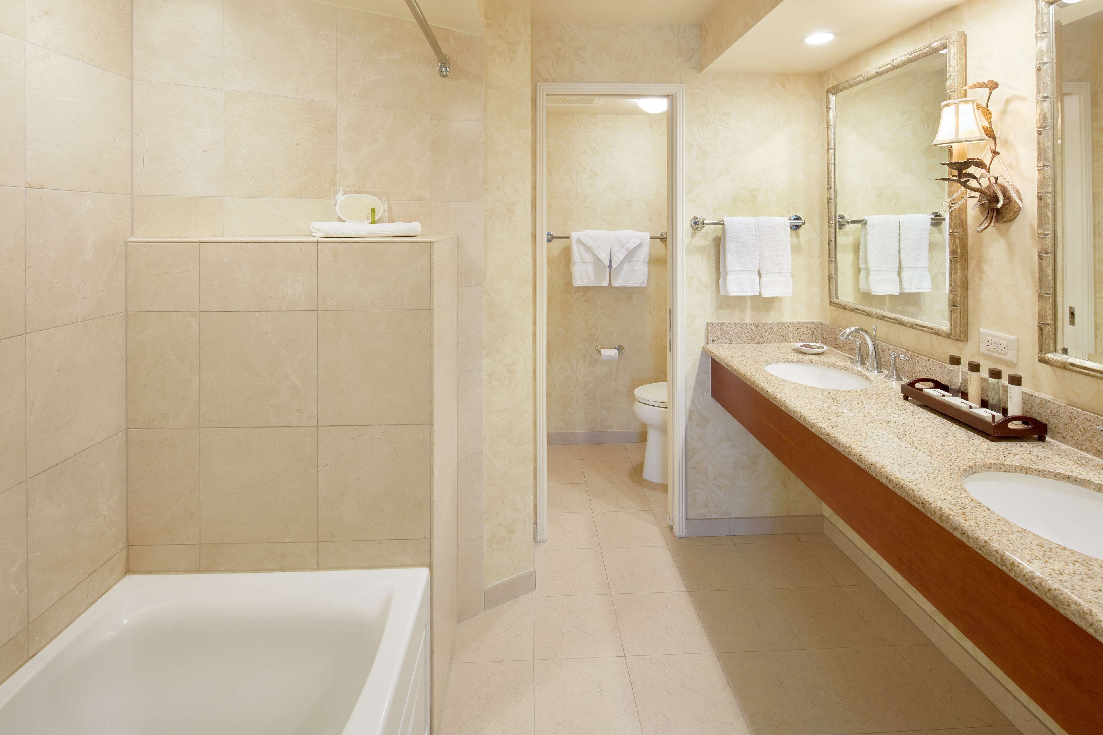 combined shower/bathtub, eco-friendly toiletries, hair dryer, bathrobes