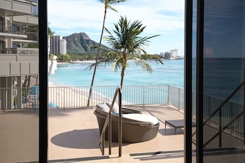 Hotel room view looking out at OUTRIGGER Waikiki Beach Resort