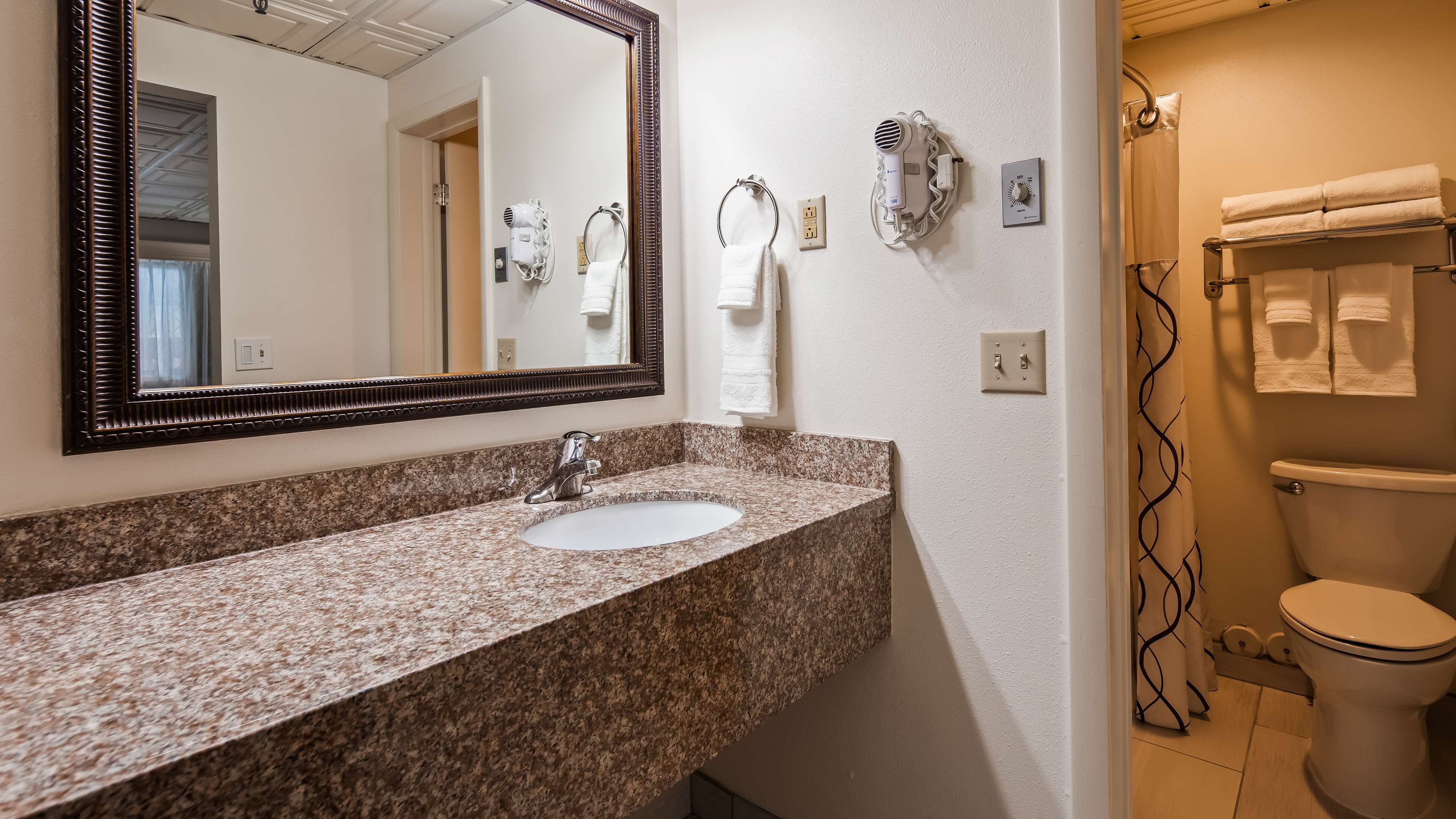 combined shower/bathtub, free toiletries, hair dryer, towels