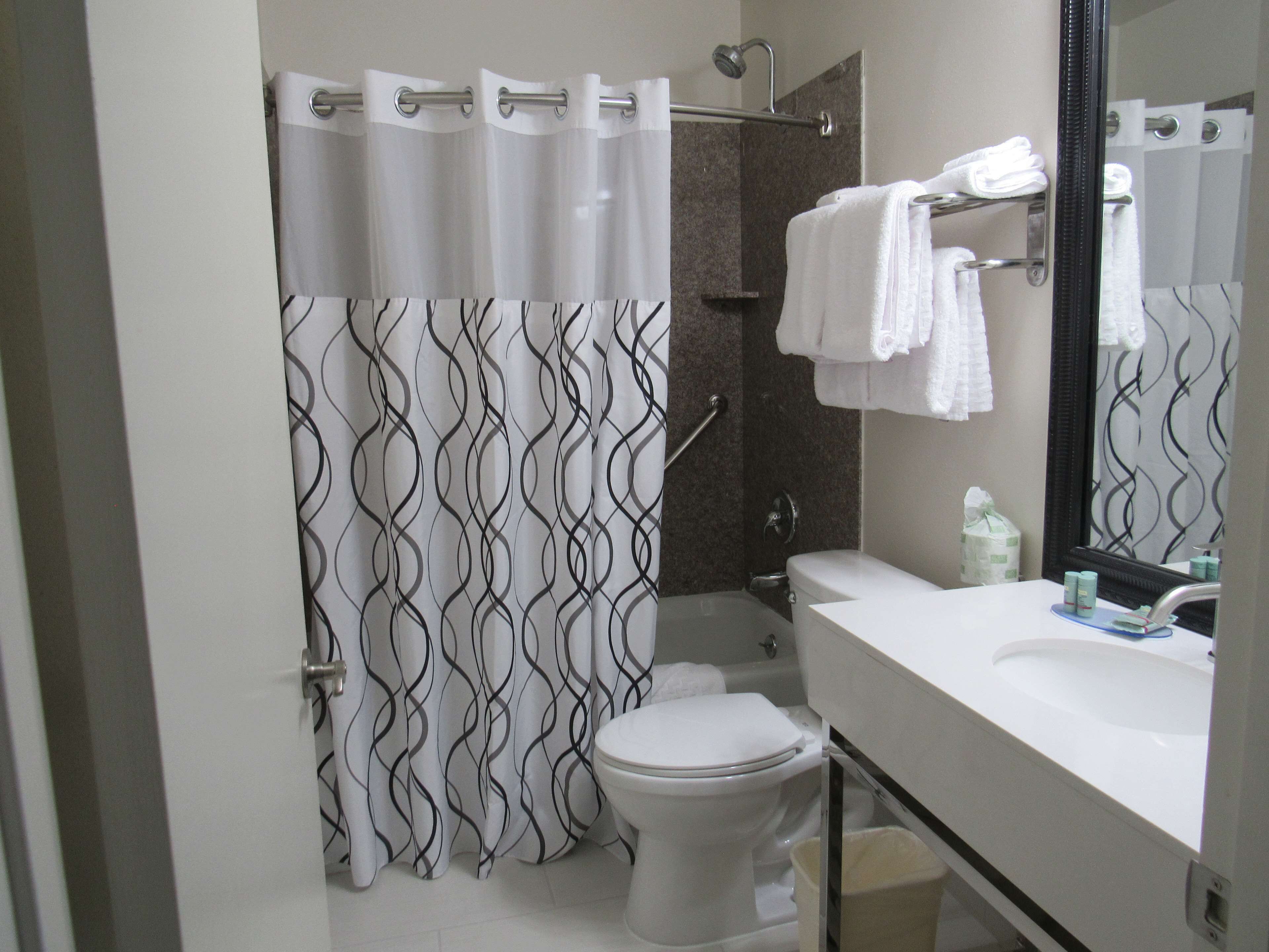 family suite, multiple beds, non smoking, refrigerator & microwave (with sofabed) | bathroom | combined shower/bathtub, free toiletries, hair dryer, towels