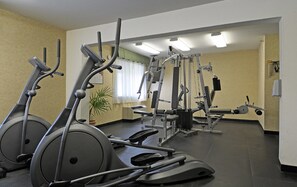 Stay fit on the go with our fully equipped gym featuring treadmills and weight training equipment.