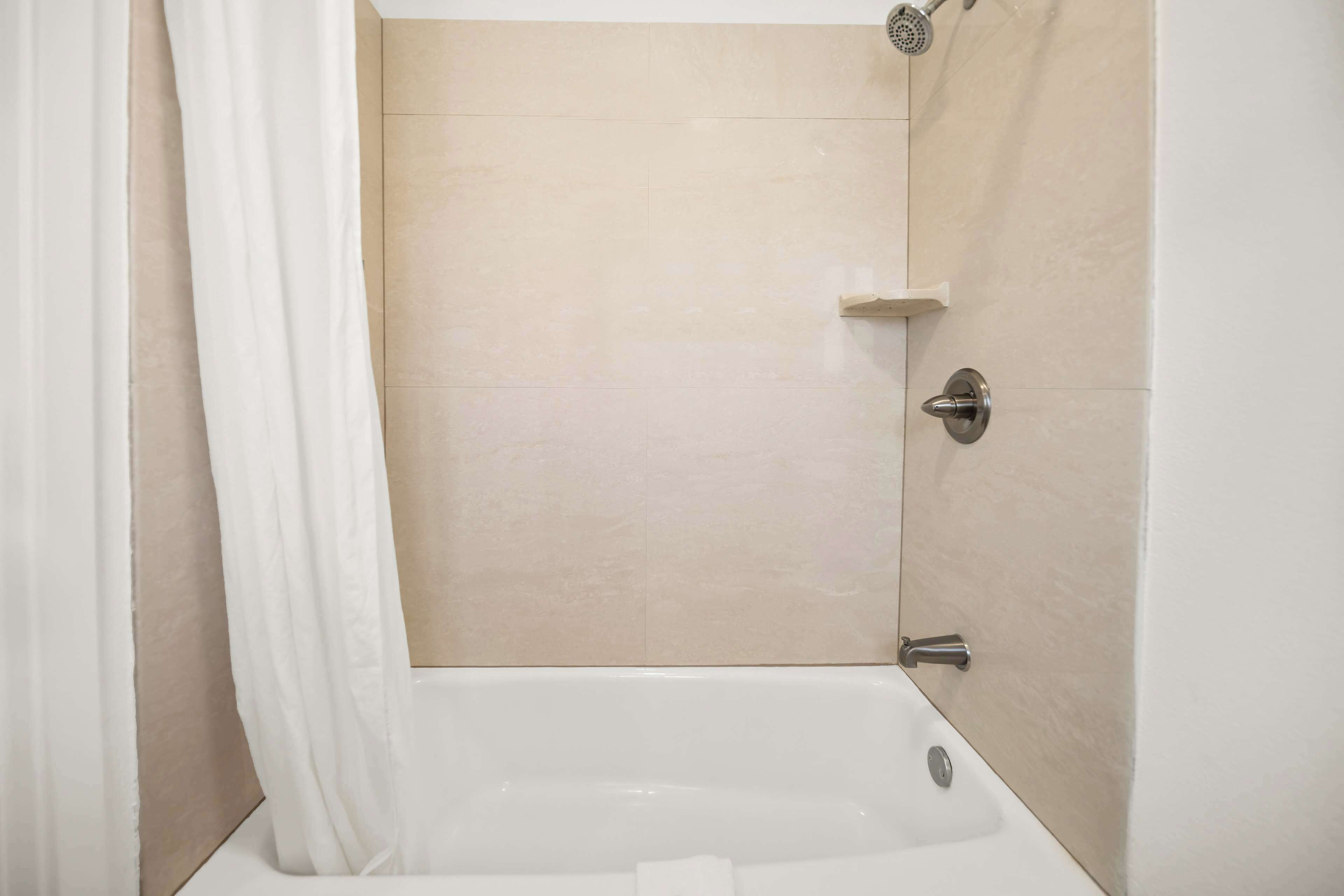 combined shower/bathtub, free toiletries, hair dryer, towels